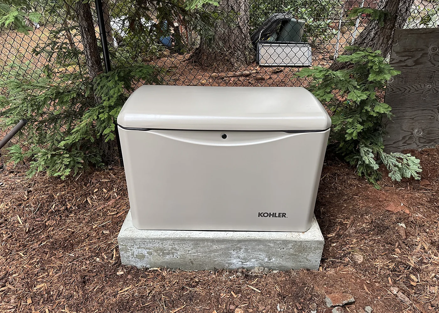 Installed standby generator on a concrete pad